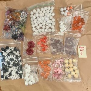 Lot 5 of 5 - 4 pounds of assorted beads.